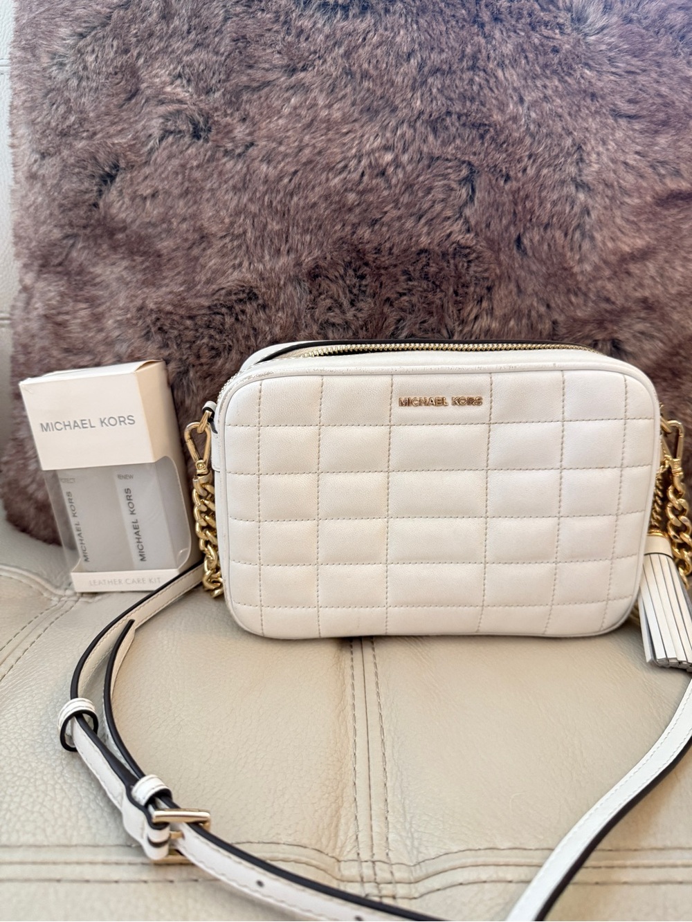 Michael Kors Quilted Leather Crossbody purse with tassel and Gold Chain